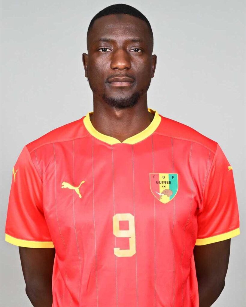 Serhou Guirassy in the red Guinea national team shirt, number 9