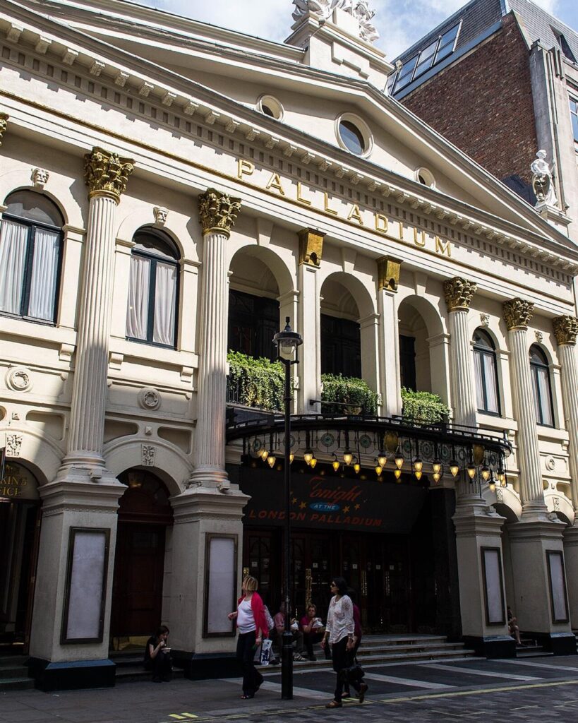 The front of the London Palladium theatre with its name in gold letters