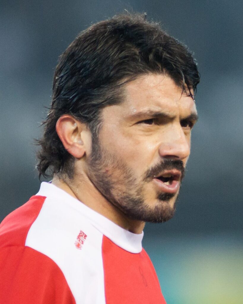 Gennaro Gattuso in a red and white FC Sion shirt, looking to the side during a game in 2013