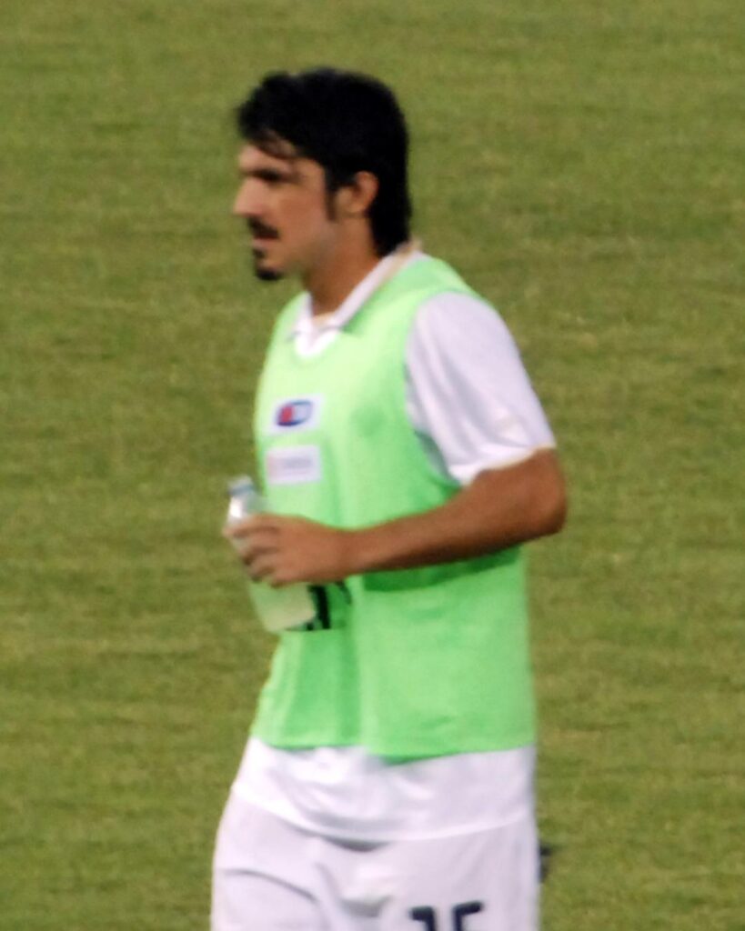 Gennaro Gattuso in a green training bib on the pitch before an Italy game